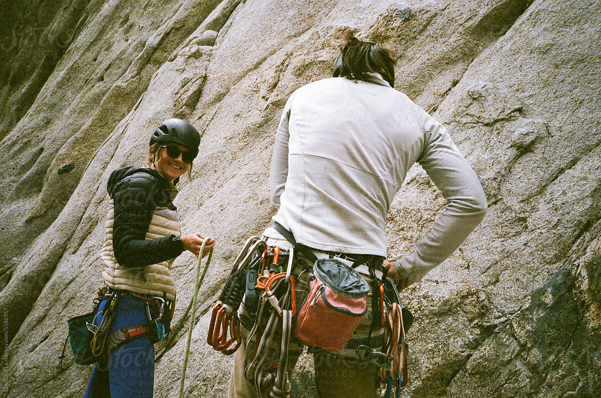 Rock climbers outside preparing