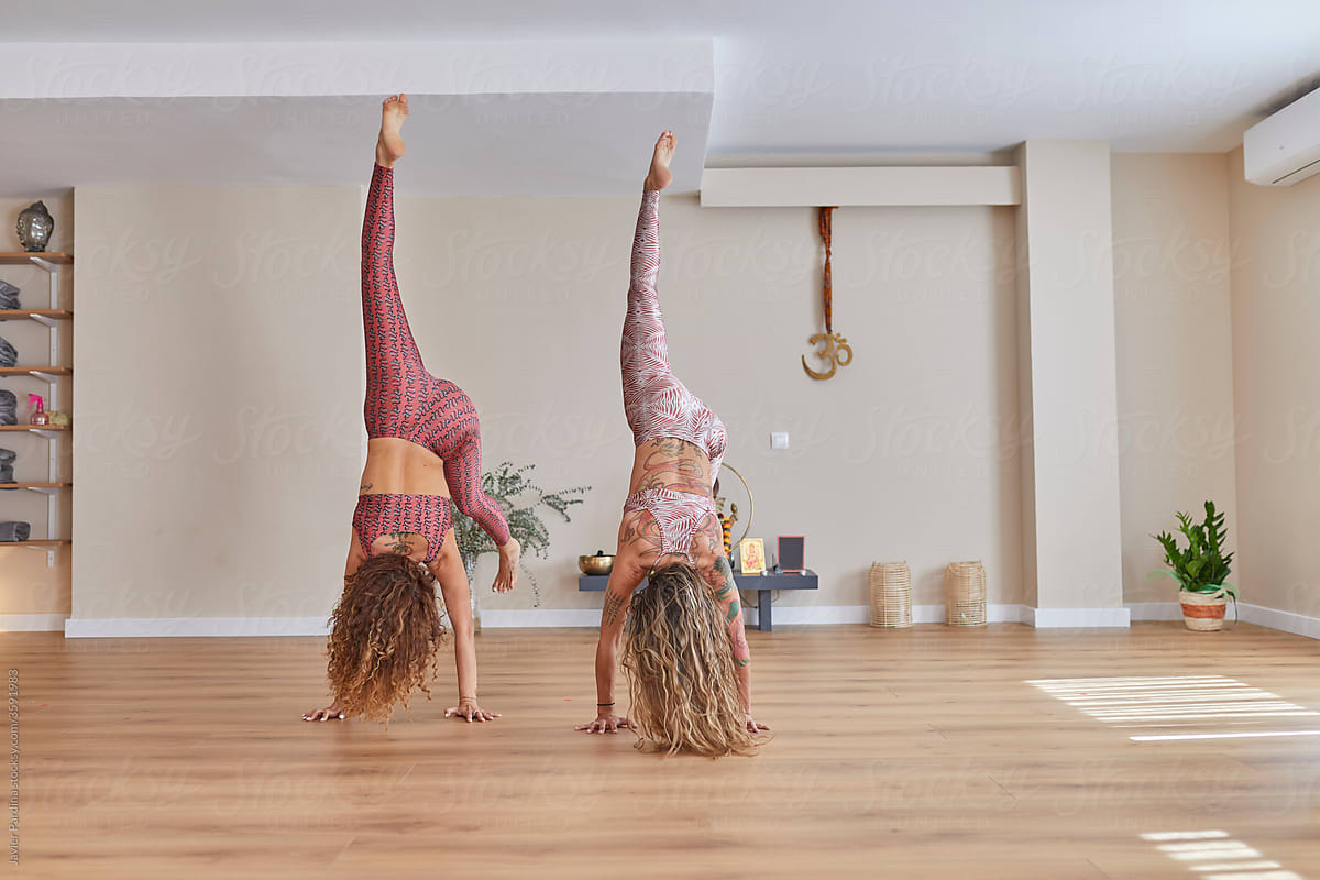 Friends practicing yoga