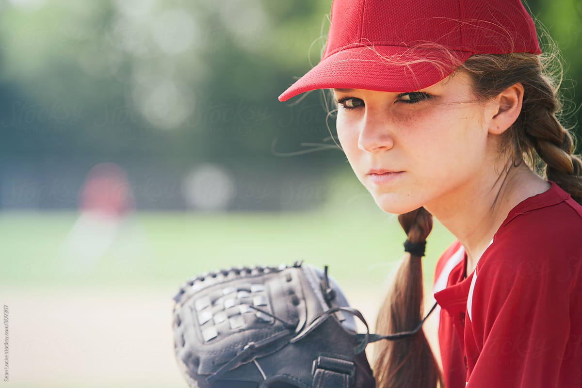 Baseball: Serious Girl Pitcher Ready To Throw Ball