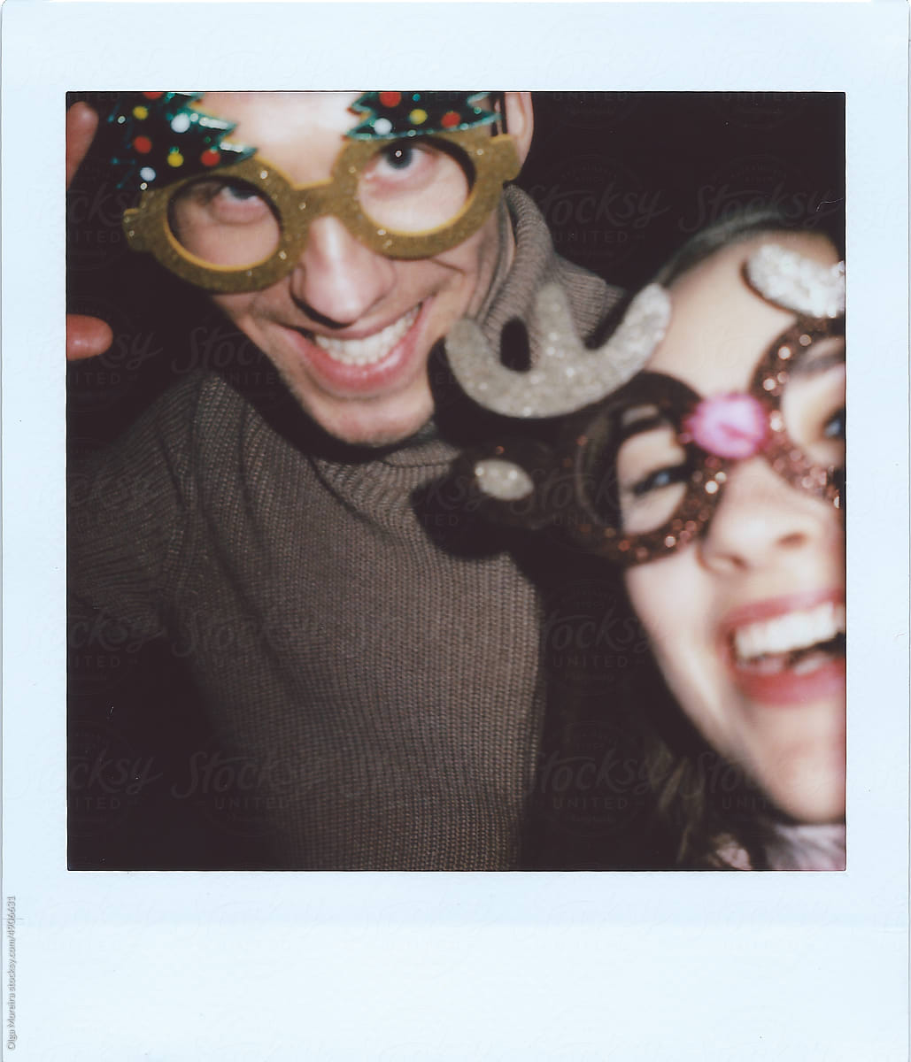 Christmas polaroid with a smiling couple