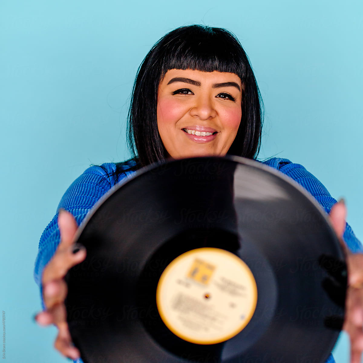 Woman holding record