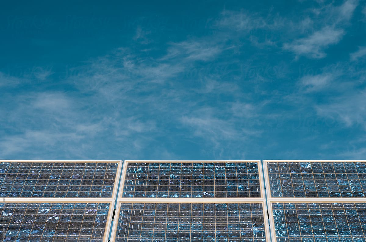 Solar Panels Against The Blue Sky