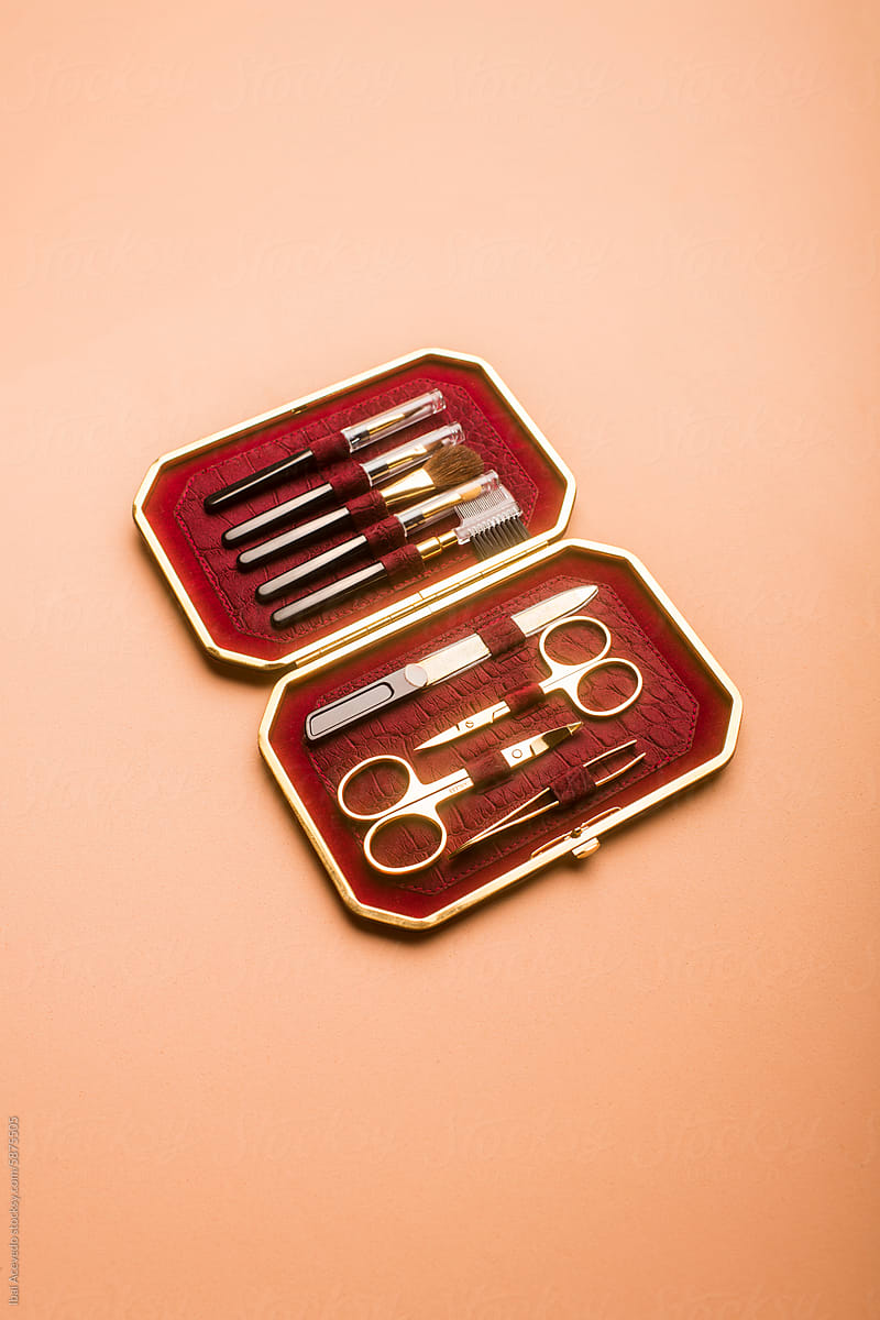 Shiny retro personal care kit on peach background
