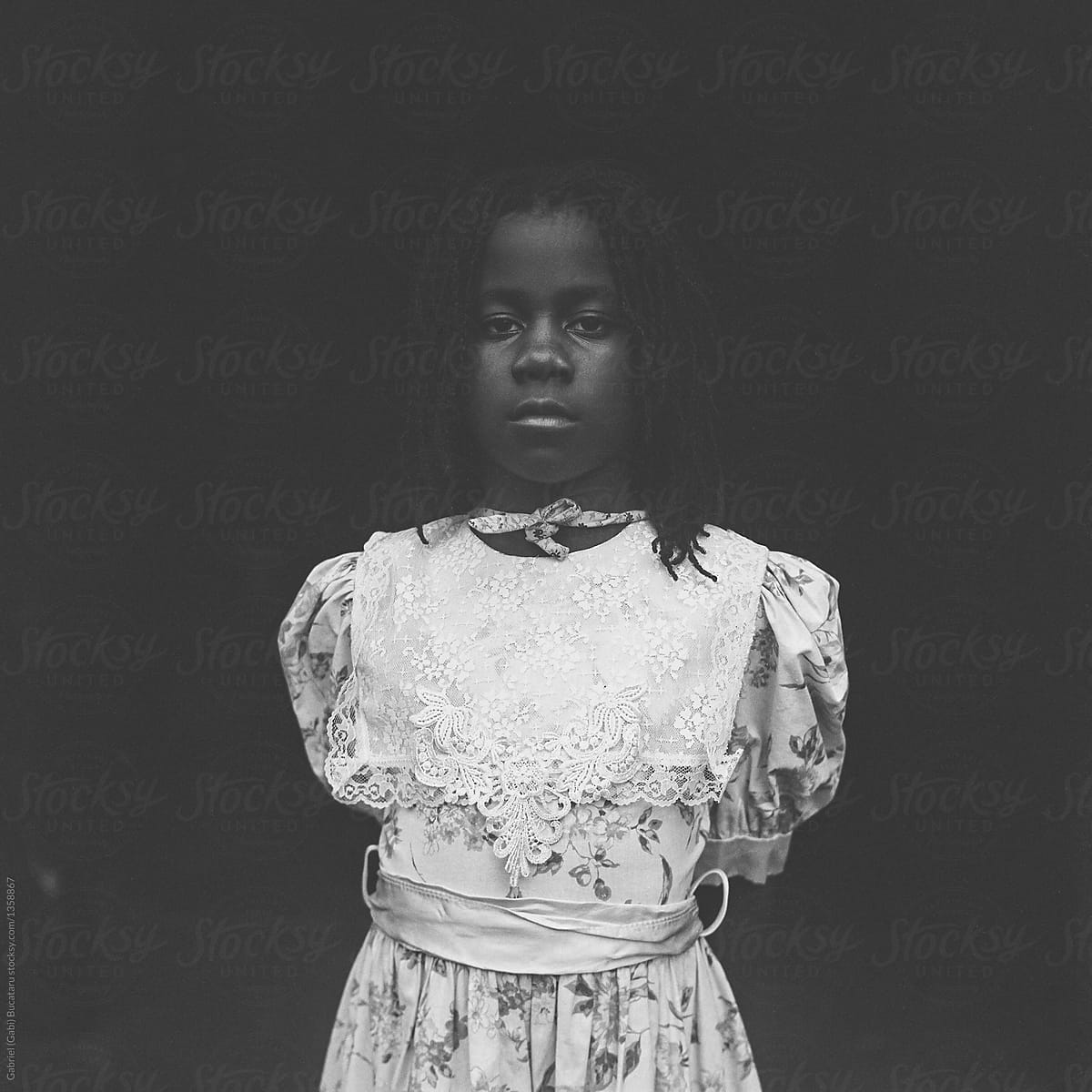 African American girl in a victorian era dress