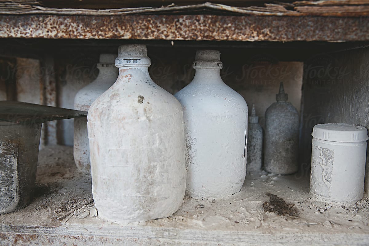bottles and jugs used for mixing chemicals and silver for making and restoring mirrors