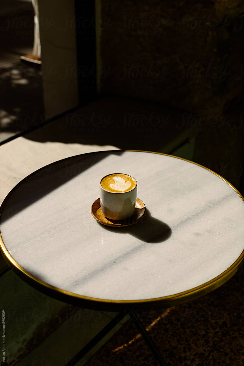 Flat white on a table at a specialty coffee shop