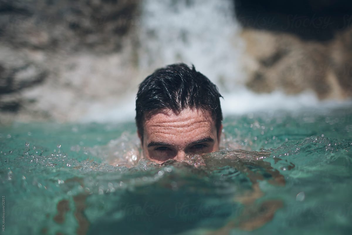 Man Swimming In Cristal Water By Stocksy Contributor Mattia Stocksy