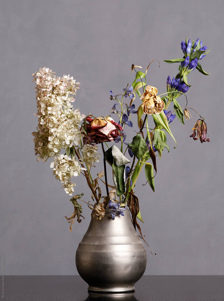 vase with wilted flowers