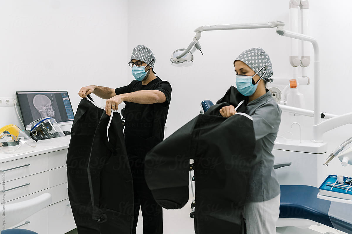Dental Clinic Workers Wearing Safety Clothes