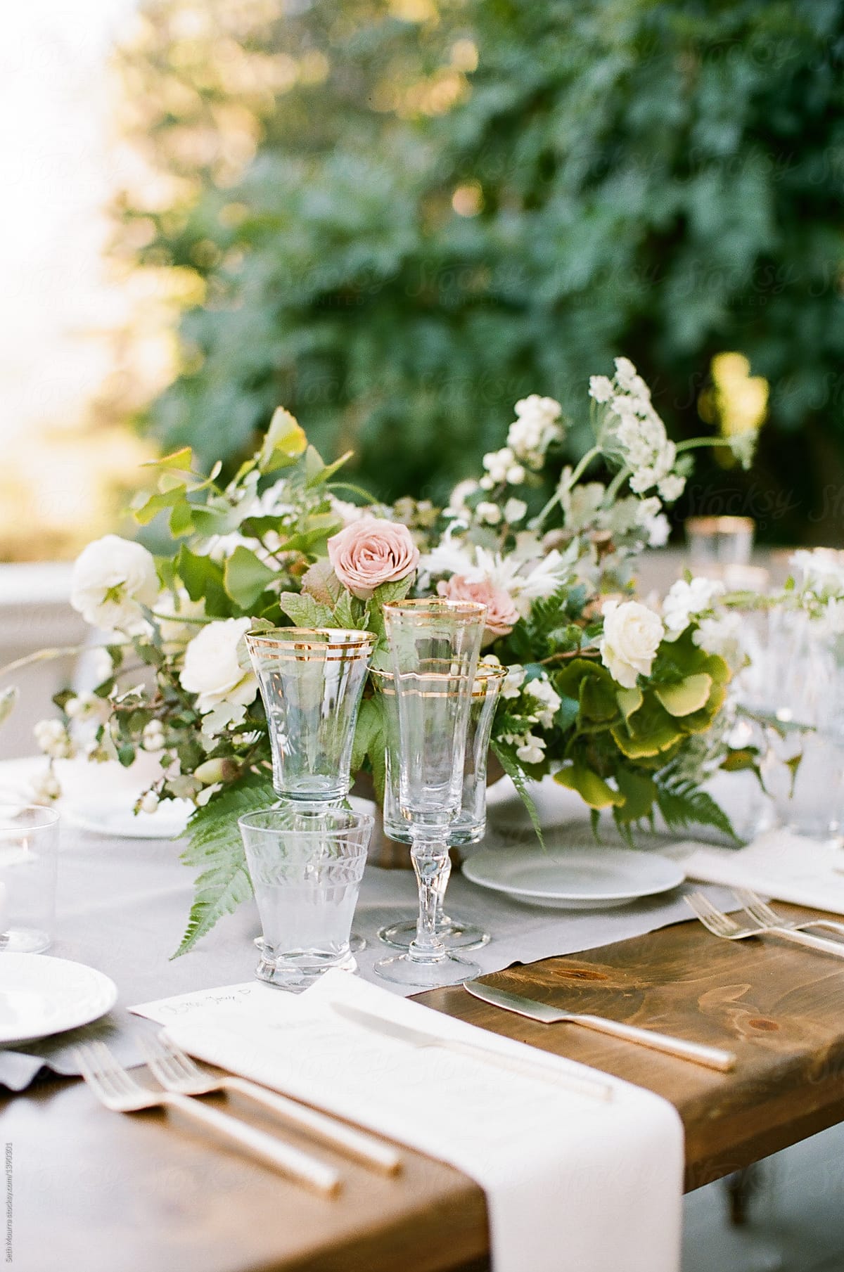 Outdoor flower arrangement on a wooden table