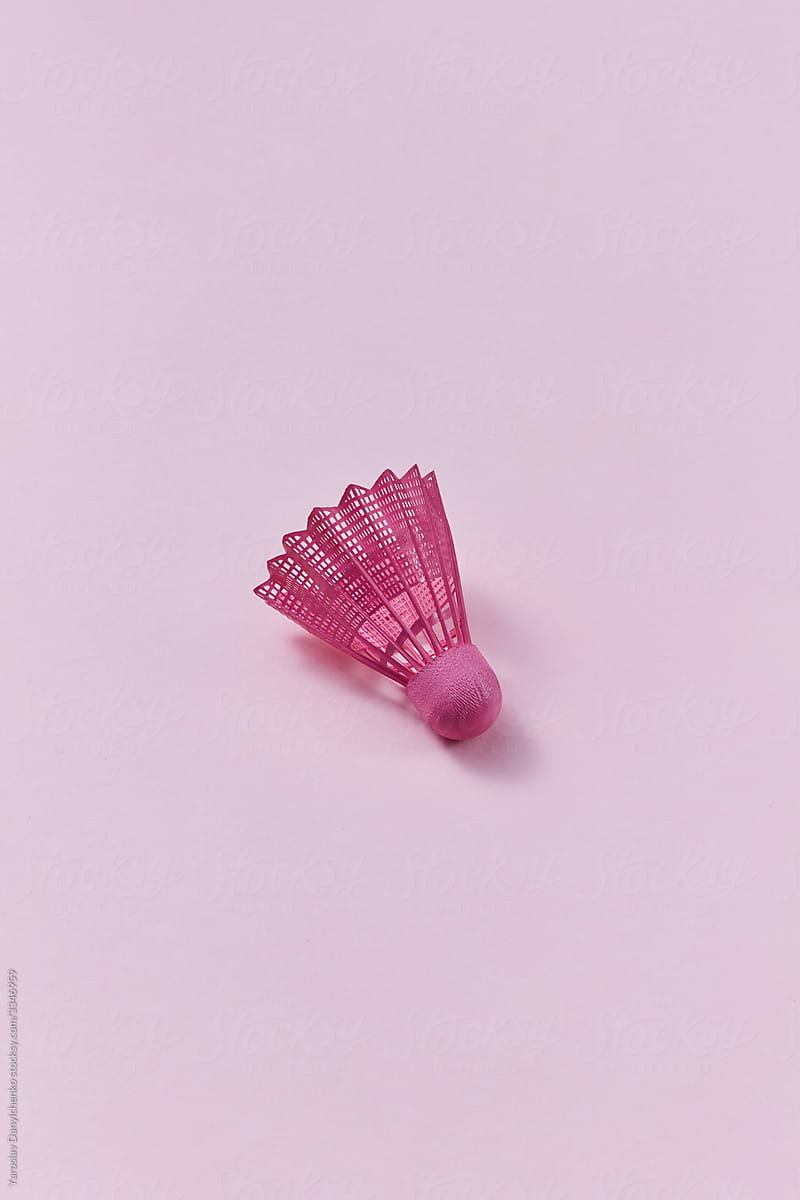 Pink plastic one shuttlecock for badminton game.