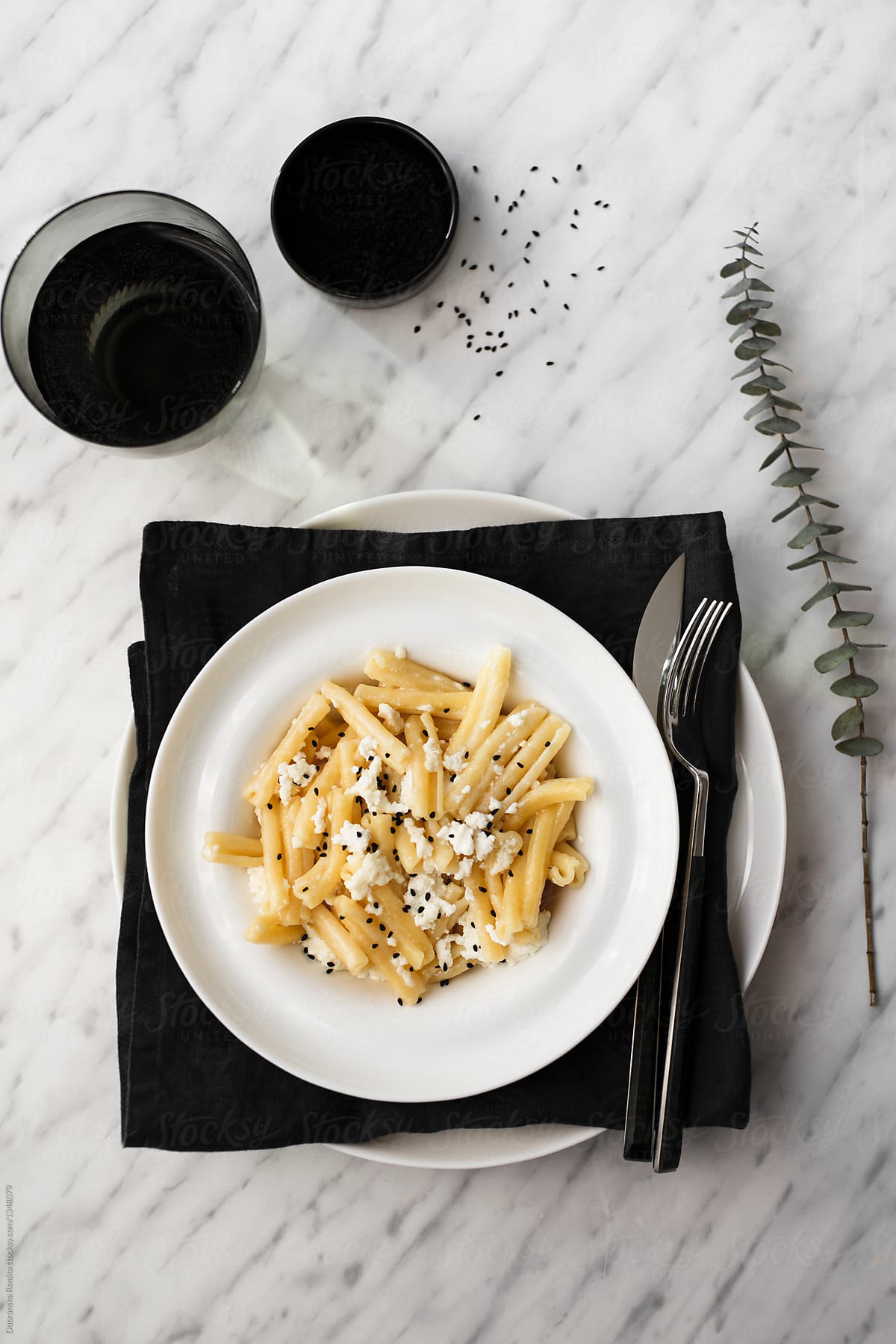 Pasta with ricotta cheese and black cumin