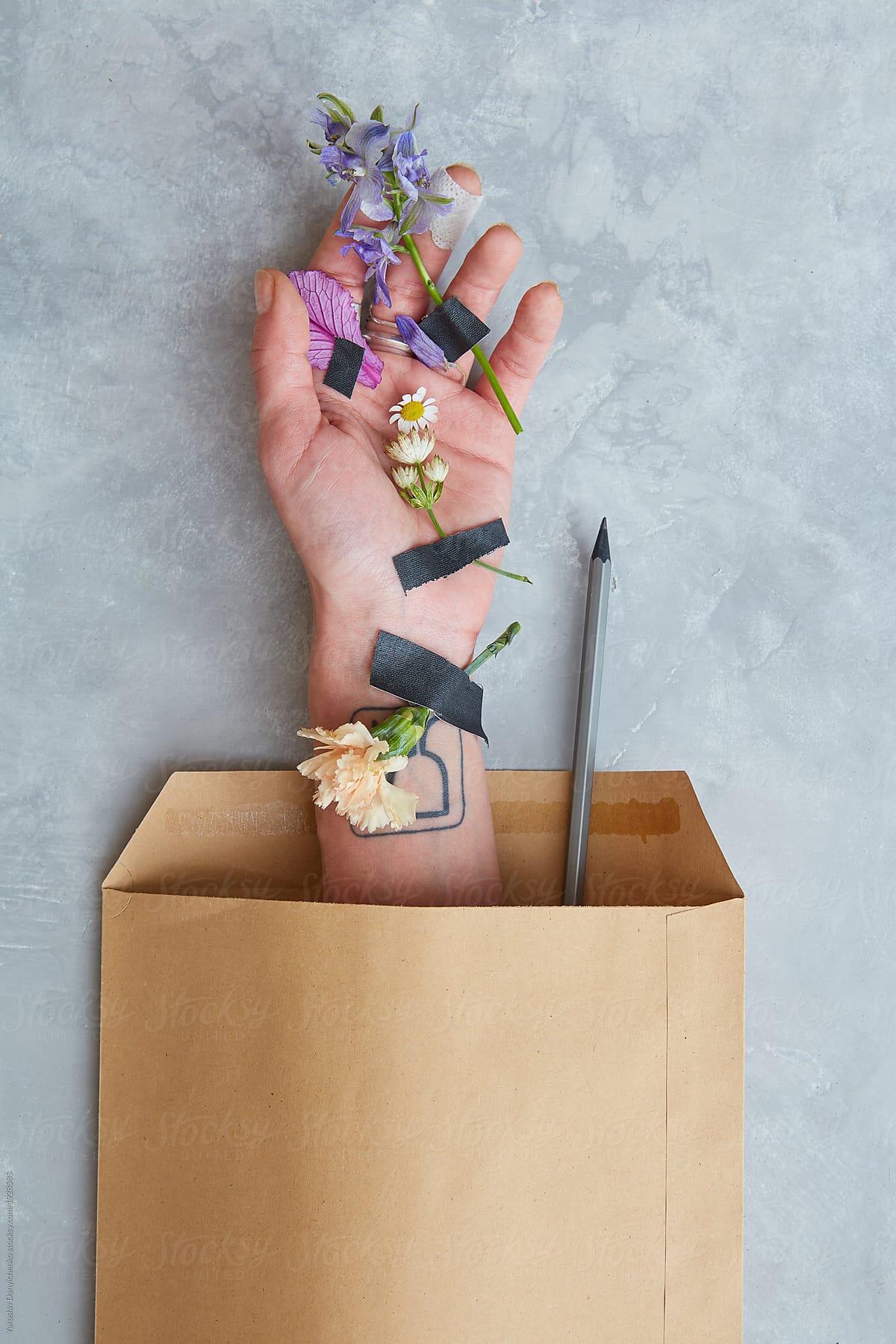 Decorated hand with envelope