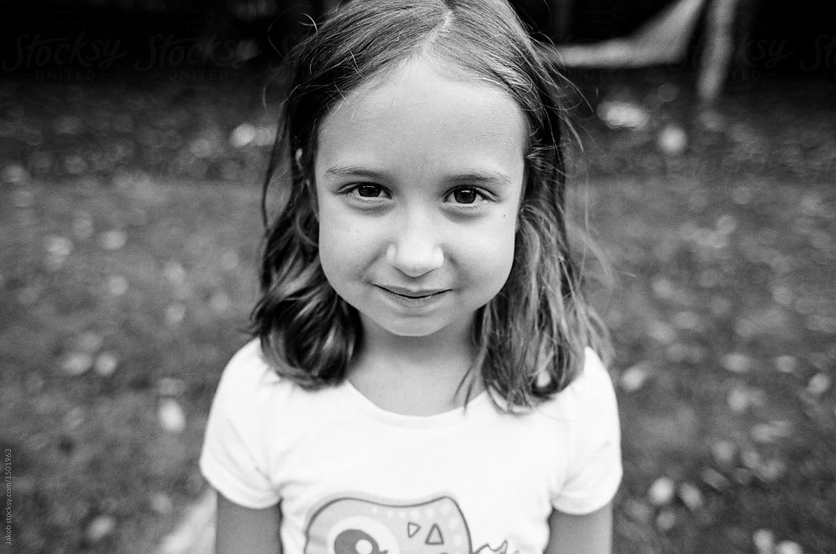 Close Up Black And White Portrait Of A Cute Young Girl By Stocksy