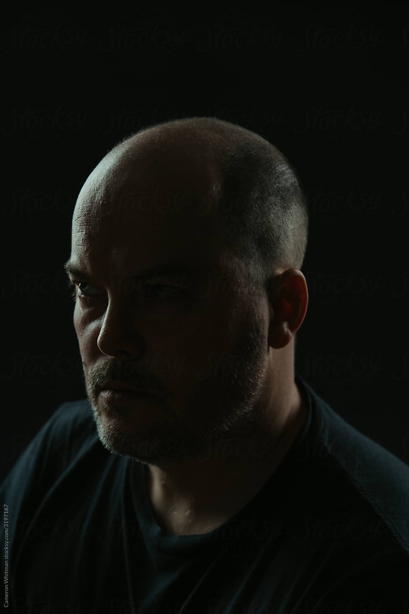 Intense dark portrait of a caucasian man