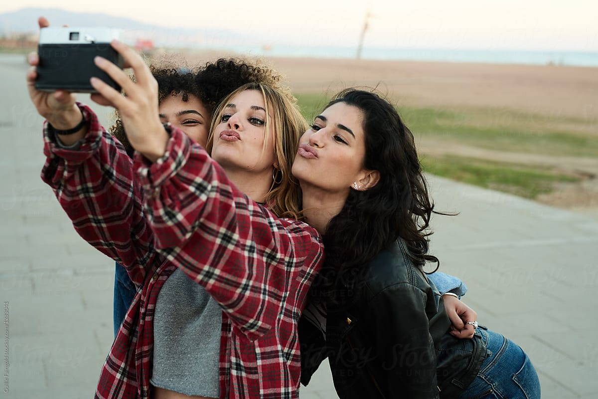 Pretty Girls Taking Selfie Via Film Camera By Stocksy Contributor Guille Faingold Stocksy 