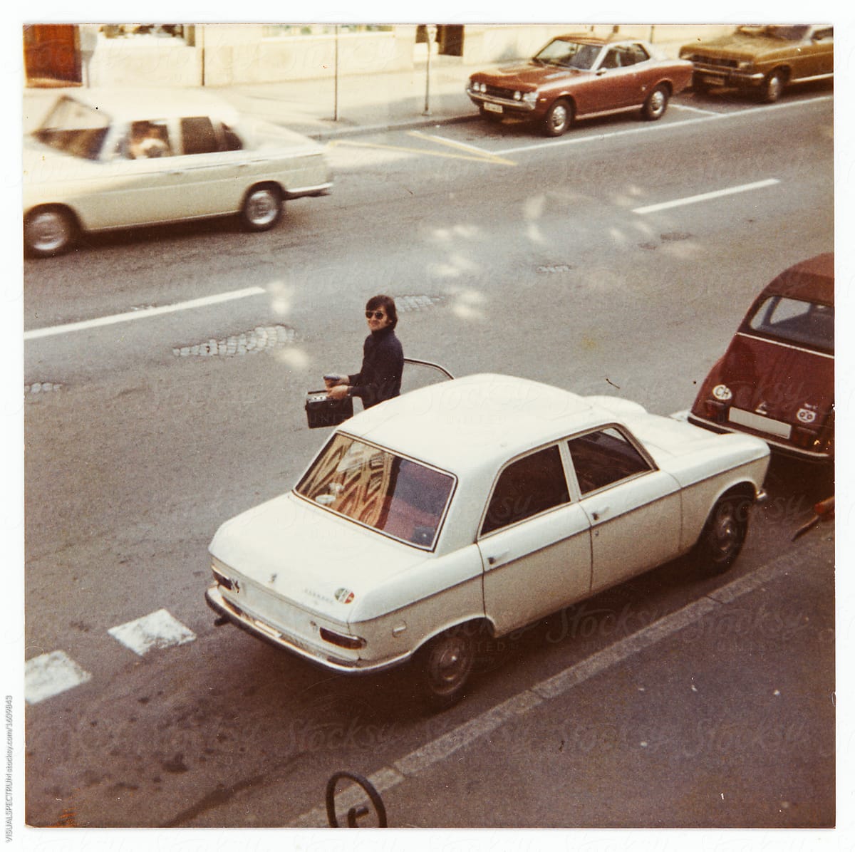 Scan of 1970s Color Photograph of Man Getting Out of Car With Ta