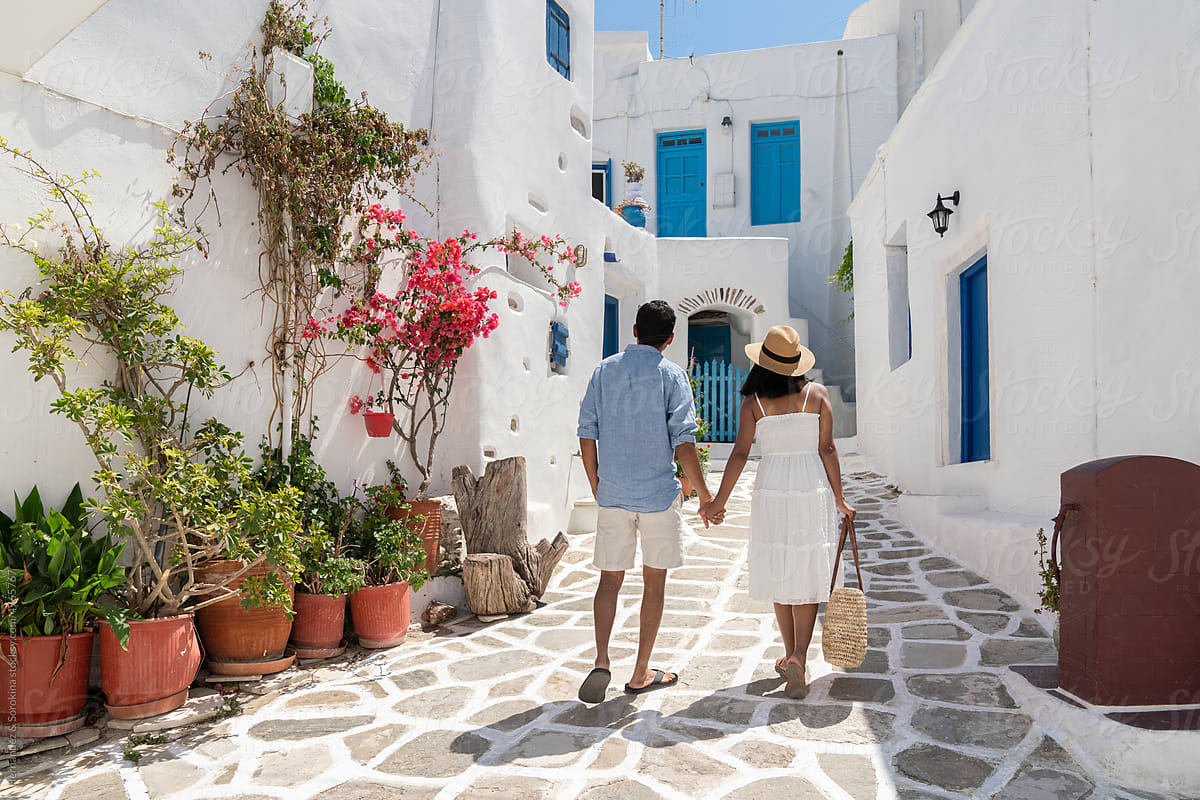 Anonymous Couple Walking In Greece