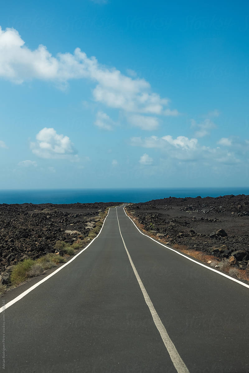 Volcanic Landscape: Serene Road Amidst Lava Formation