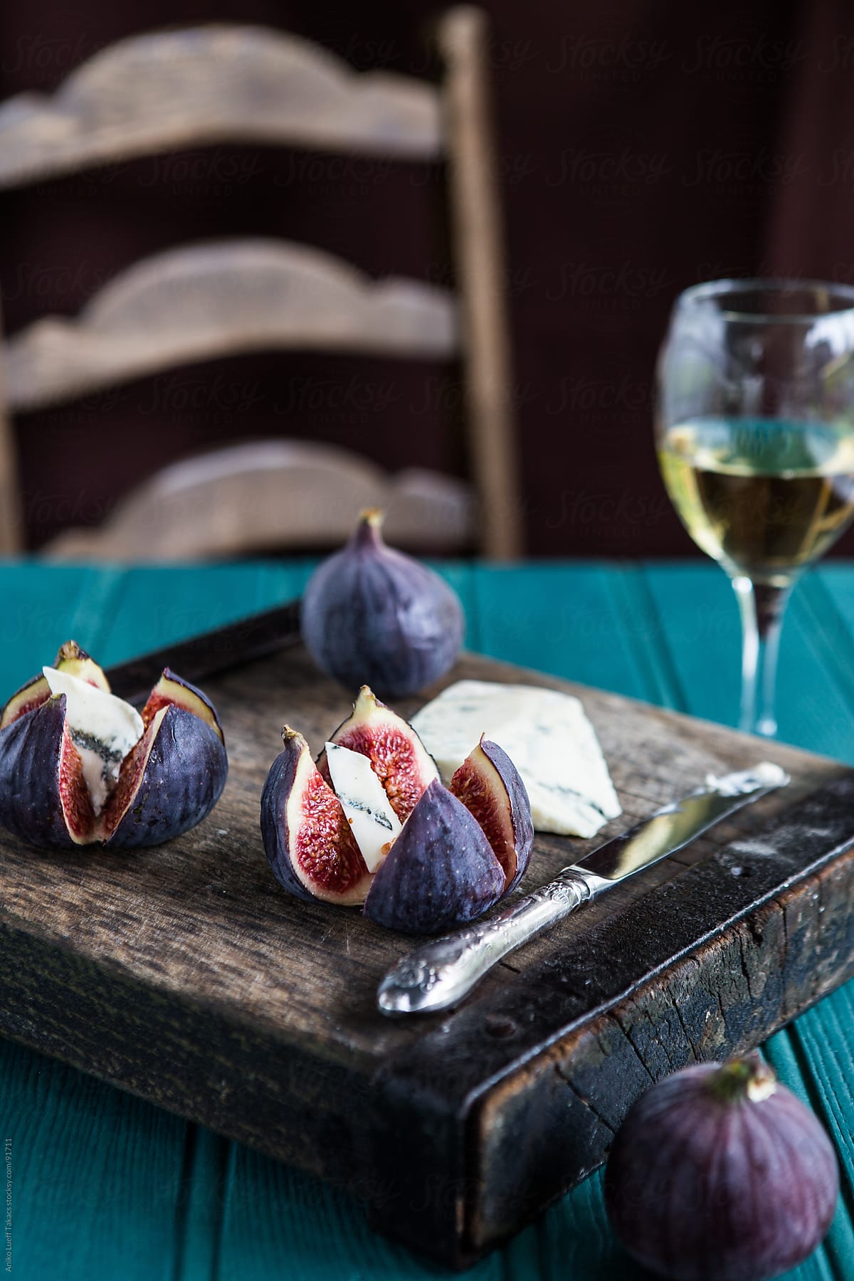 Figs and gorgonzola on an old board