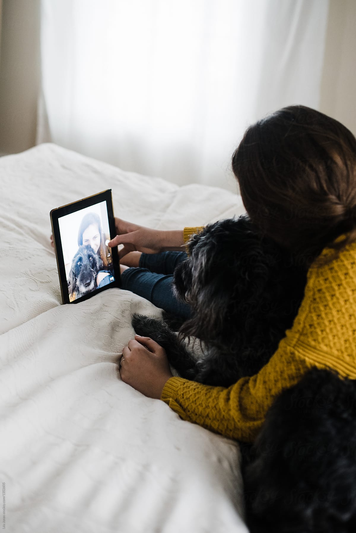 Teen Taking Selfies With Her Dog By Lea Jones Stocksy United
