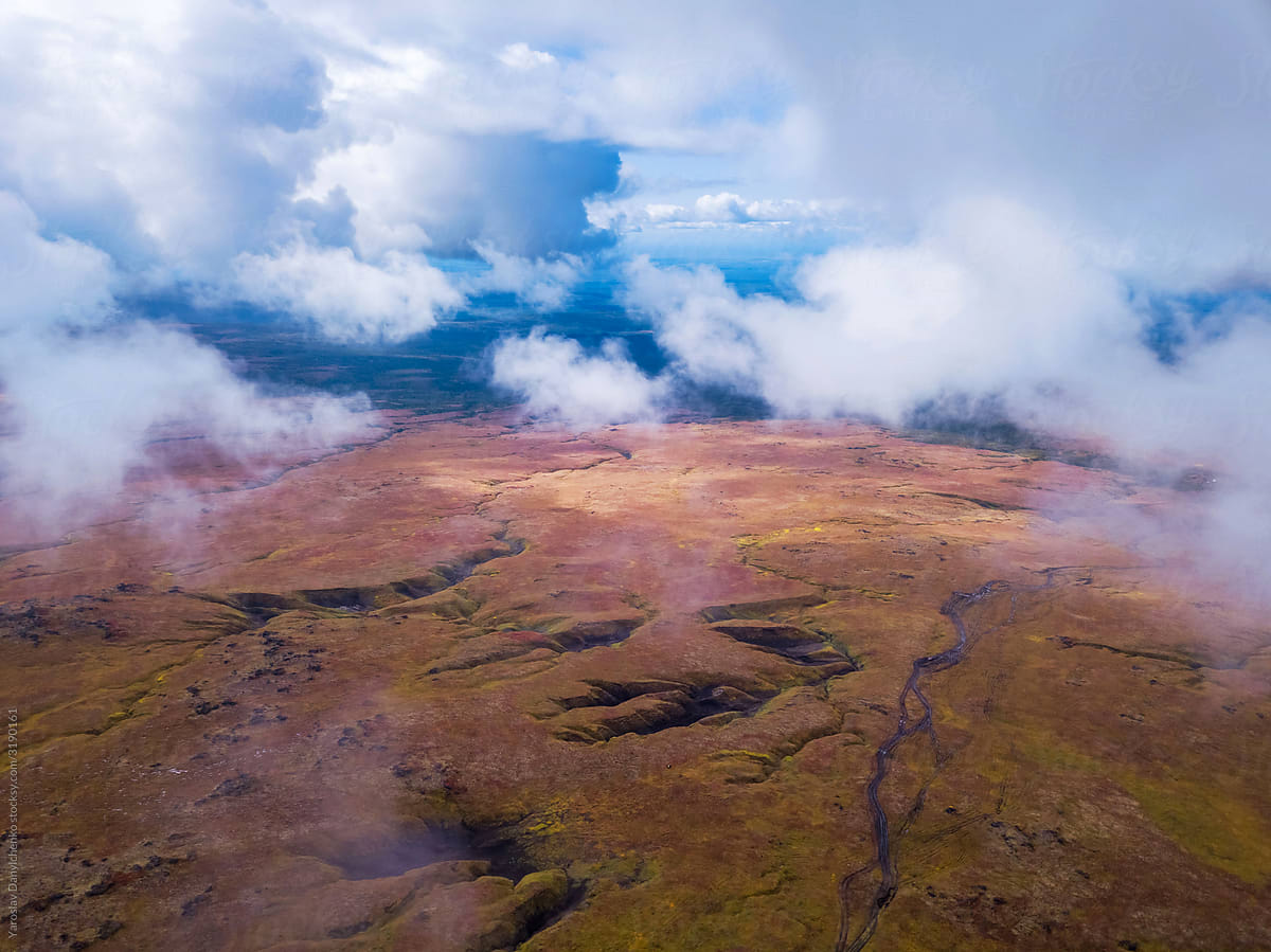 Cloudscape view from drone above rocky areas in Kamchatka krai.
