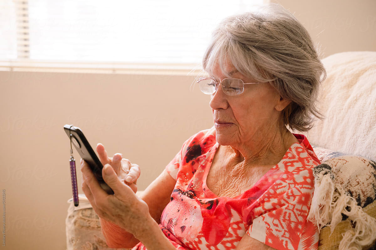 Senior Woman Looking at Phone