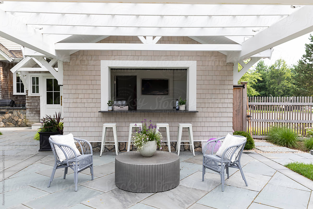 Residential luxury Home outdoor patio with pergola bar