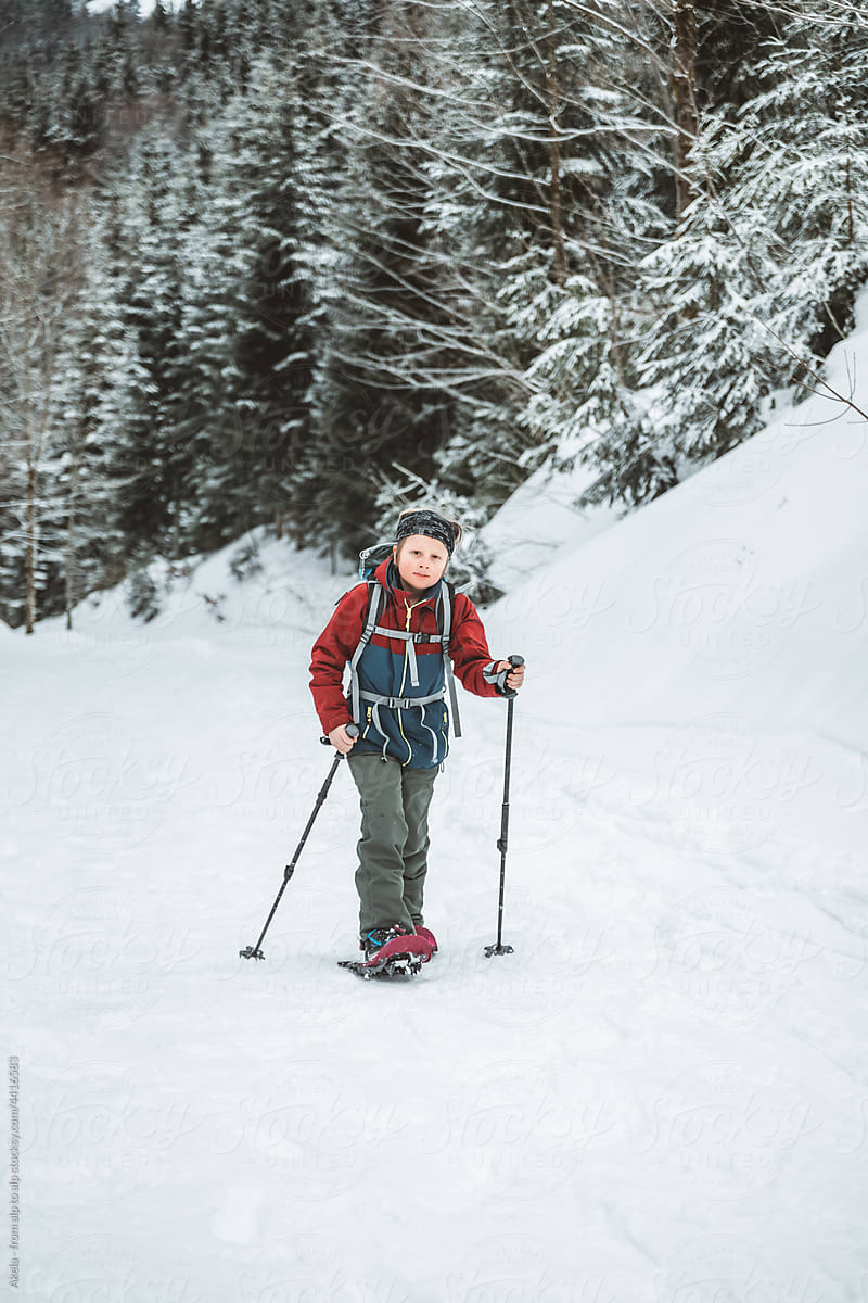 Kid in snow shoes
