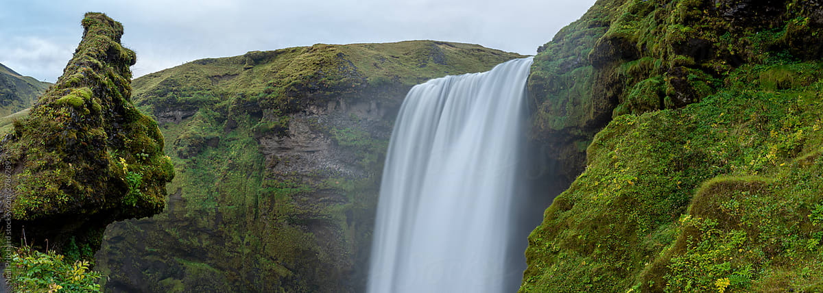 A panoramic view of skogafoss waterfall in iceland