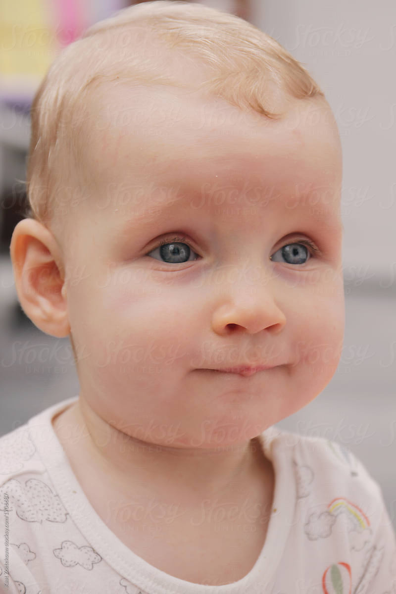 toddler with blonde hair and blue eyes