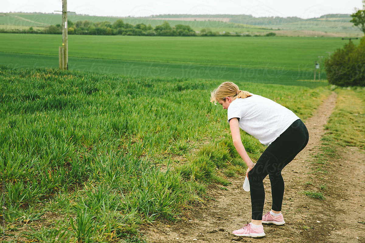 Young teenager running in the countryside