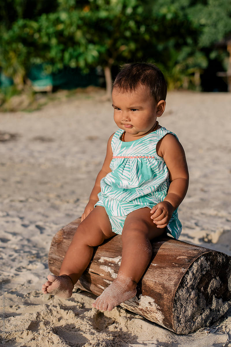 Baby Girl Making Faces on the Beach