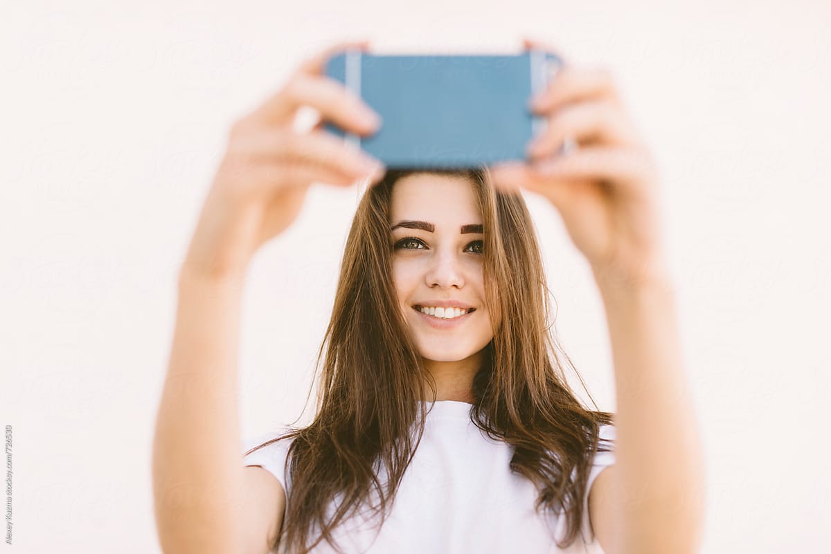 Babe Happy Woman Taking A Selfie Del Colaborador De Stocksy Alexey Kuzma Stocksy