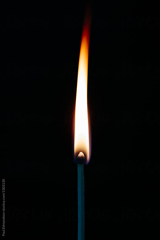 Close up lit match and flame