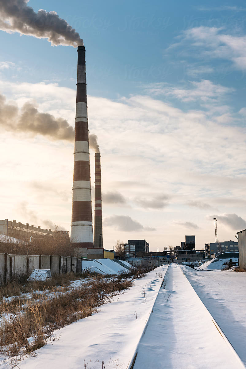 Powerplant chimneys with smoke in Omsk, Siberia