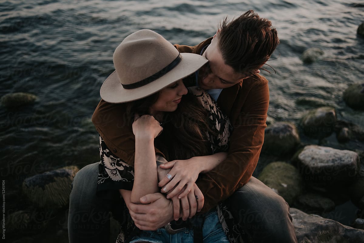 Young Adventurous And Attractive Couple Cuddling And Hugging On Beach At Sunset Del 