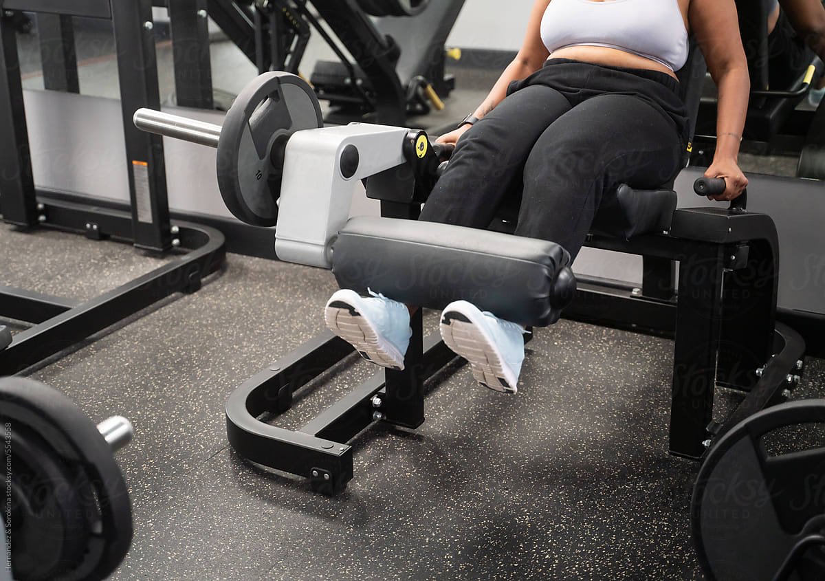 Anonymous Plus Size Woman Working Out In The Gym