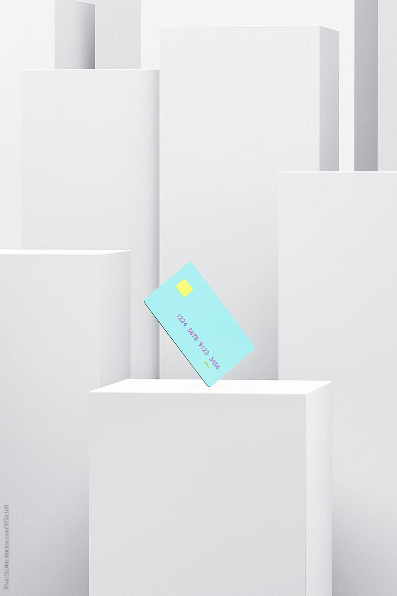 Blue credit card on product display podium