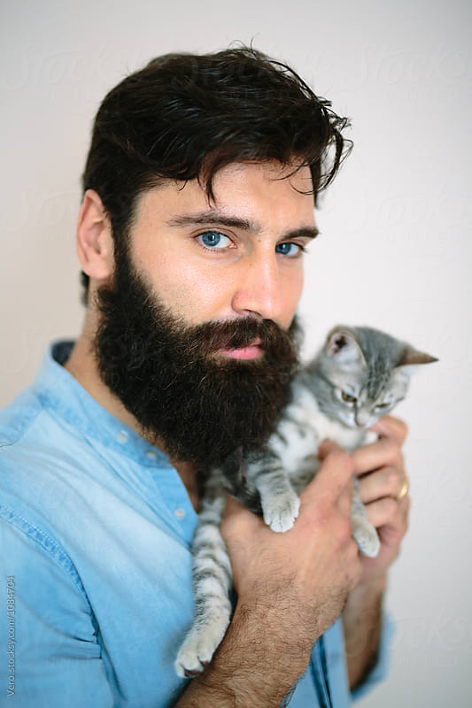 Bearded man with a kitten