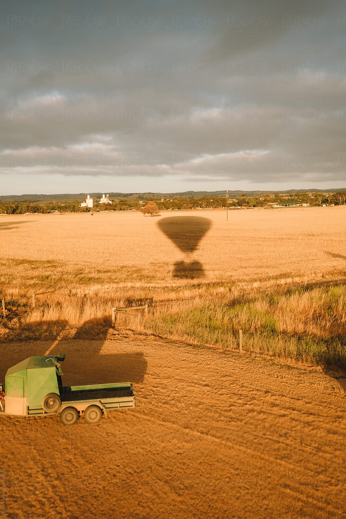 shadow of hot air balloon on fields in country Australia