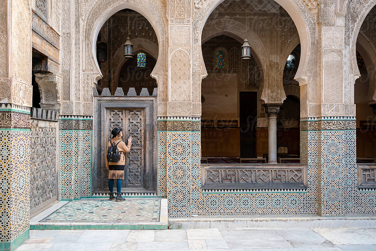 A woman visiting a palace in Morocco