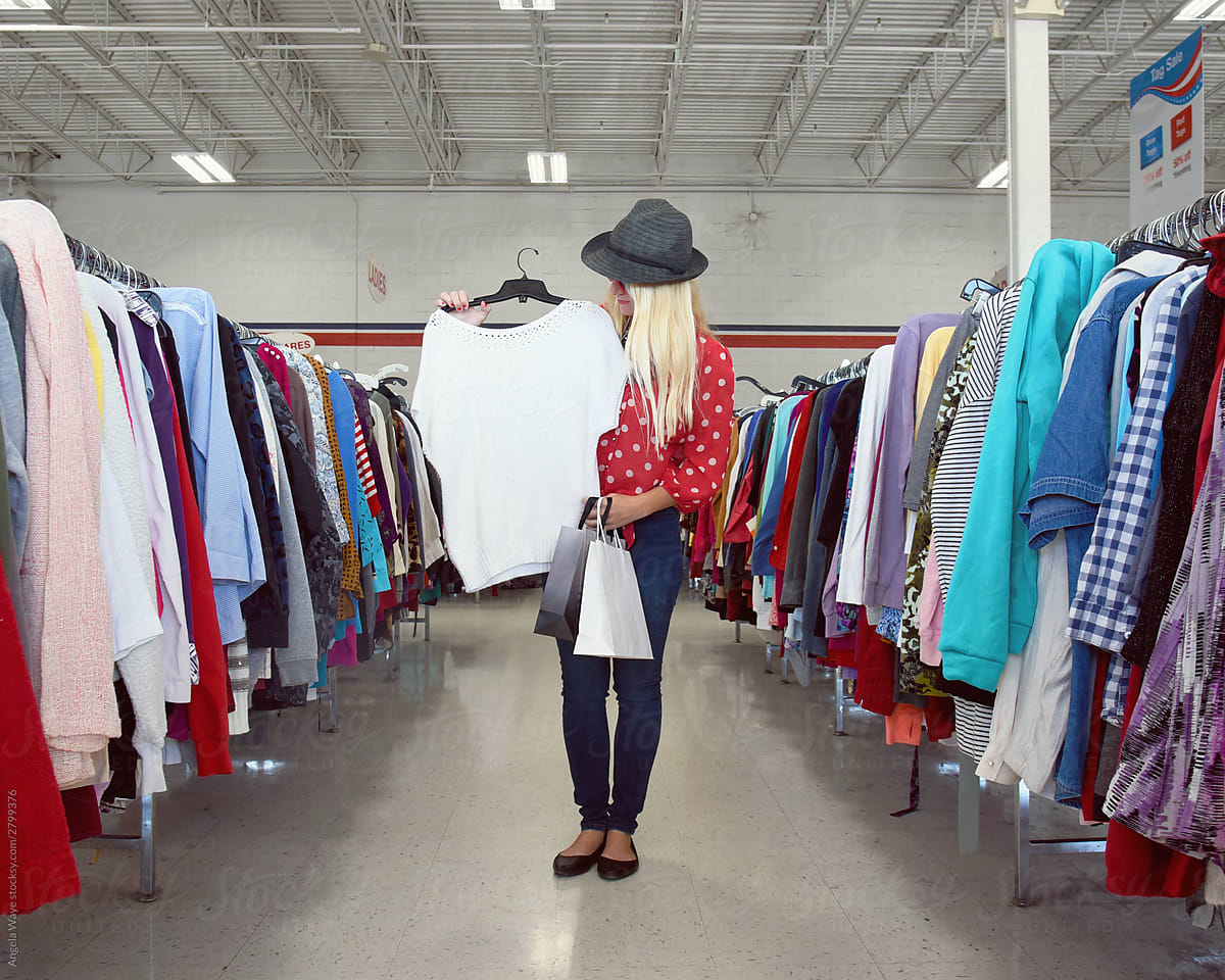 Girl Shopping at Vintage Clothing Thrift Store