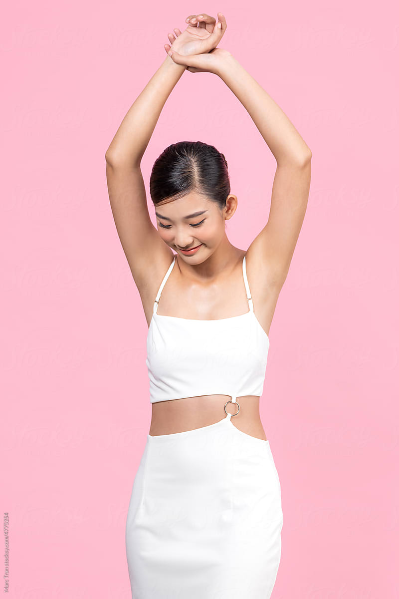 Beautiful Young Woman with Clean Fresh Skin and show armpit