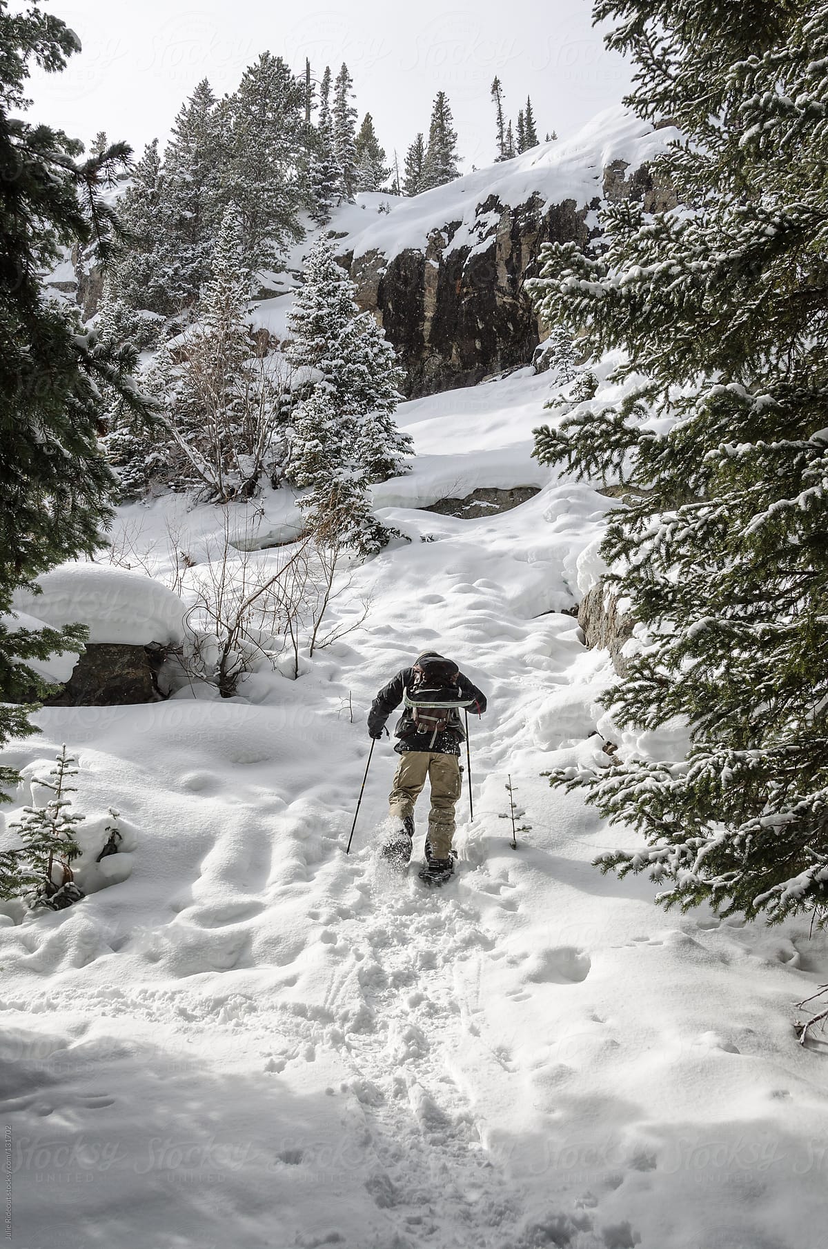 Man snowshoeing in the Colorado Rockies