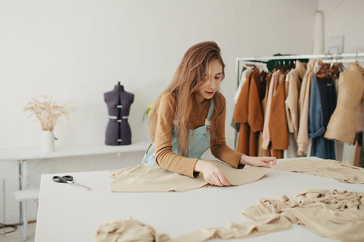 Fashion designer work in her studio