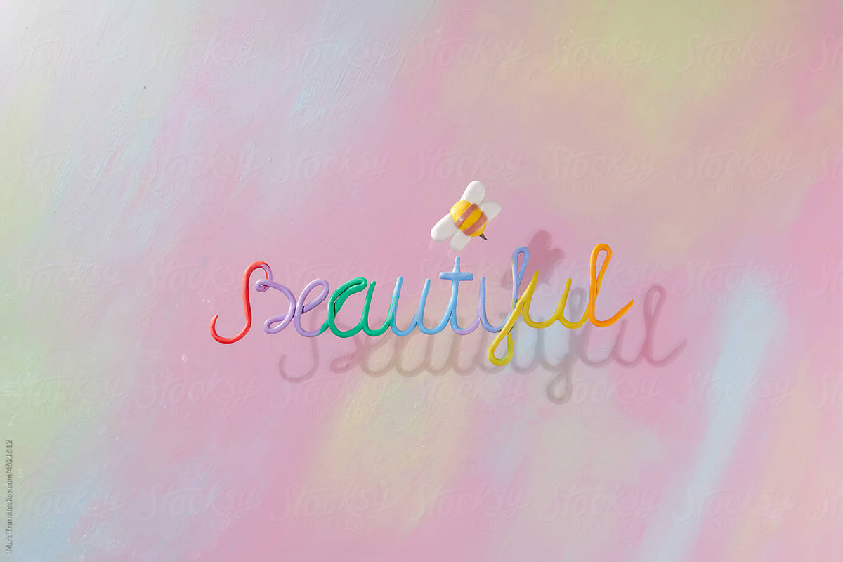 On a colorful background, the word \