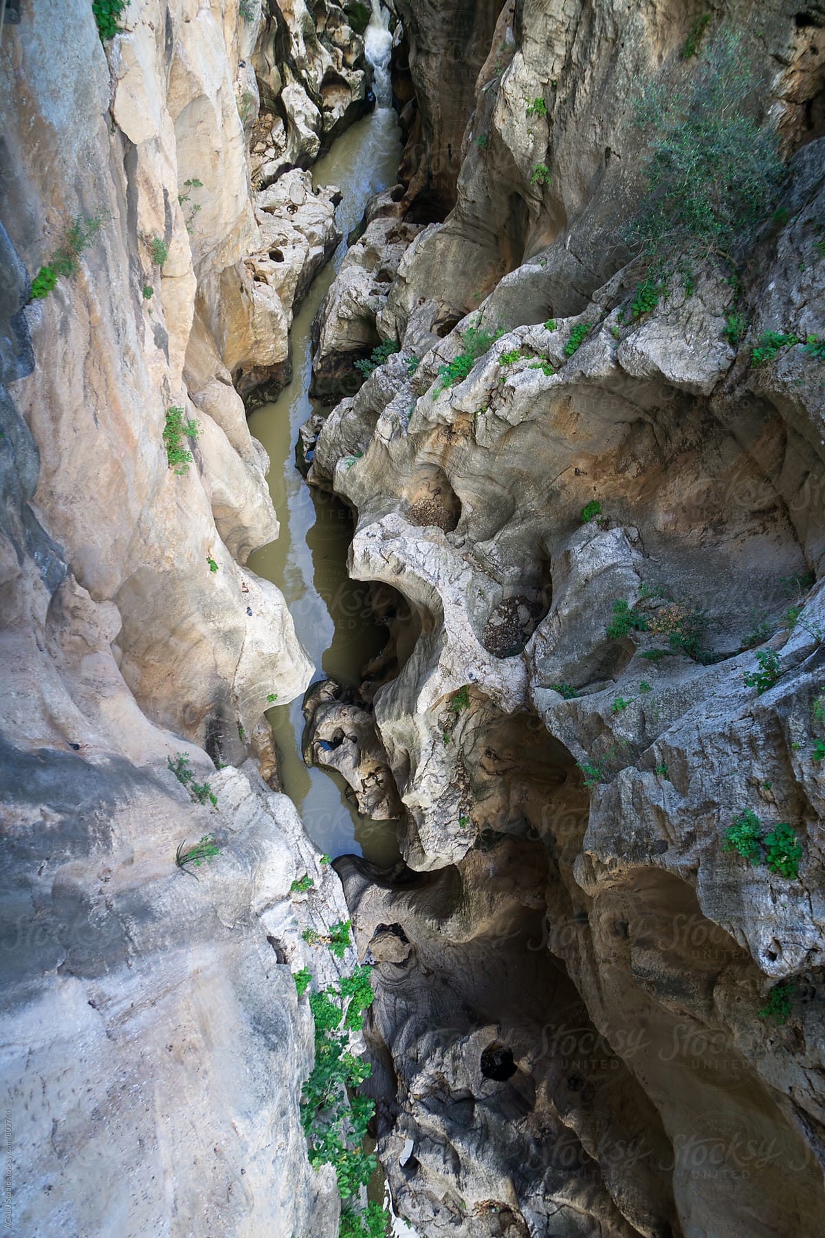 View from above at the edge of a cliff in Caminito del Rey