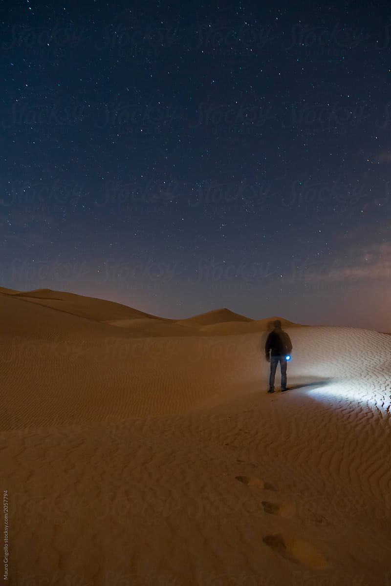 Man alone in the middle of the desert