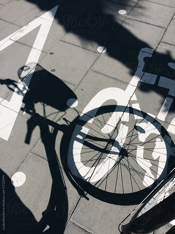 Bicycle shadow on bicycle path